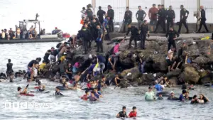 Ceuta migrants surge as Spain labels influx attack
