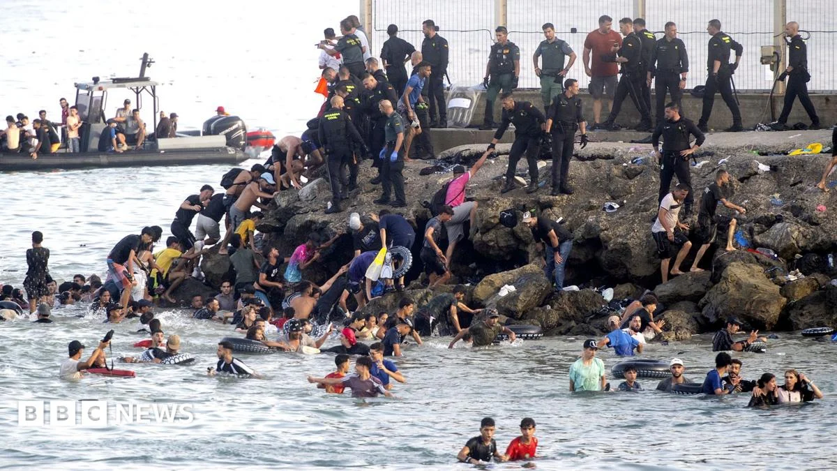 Ceuta migrants surge as Spain labels influx attack