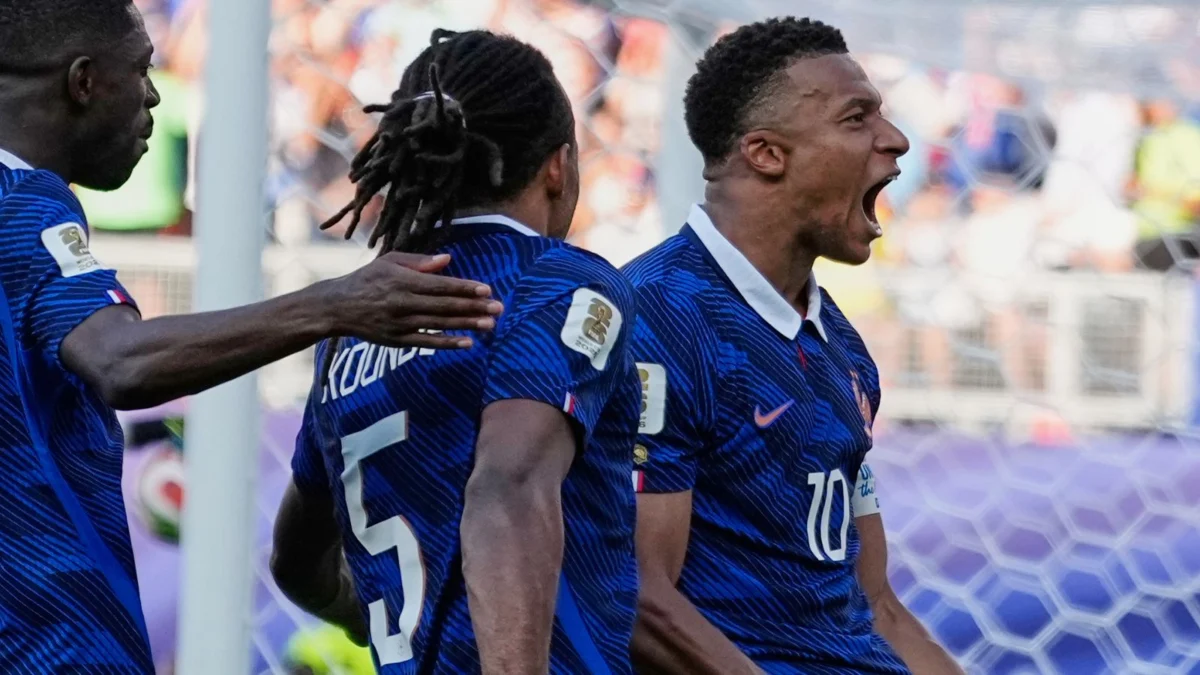 Mbappe penalty sends France past Paraguay