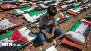 Mass funeral held for 112 Palestinians killed in Israeli strike