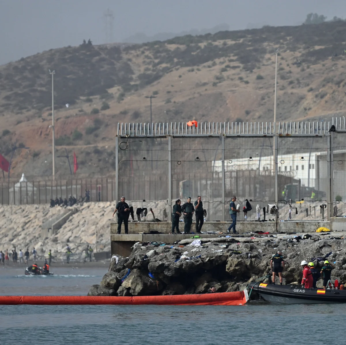 Spain Installs Floating Barrier in Ceuta After Migrant Influx