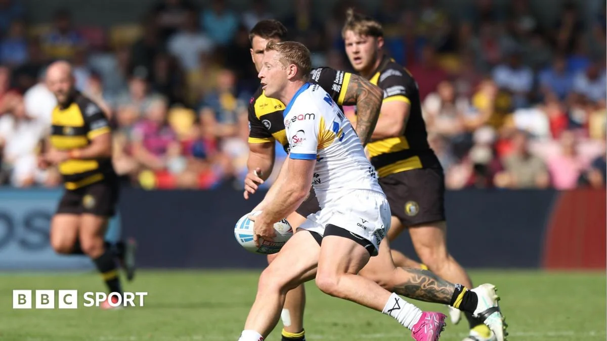 Leeds Rhinos crush York 66-16 to top Super League