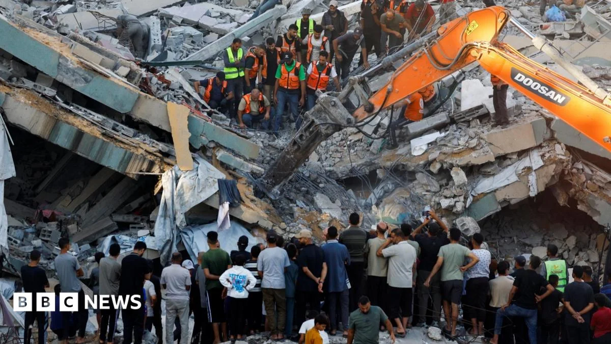 Gaza building collapse kills at least 12, dozens missing