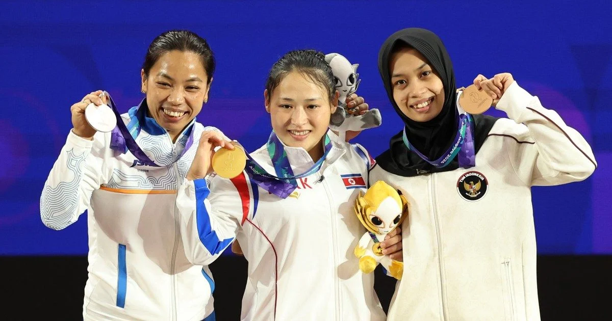 Mirabai Chanu Wins Asian Games Silver as Ri Breaks Record