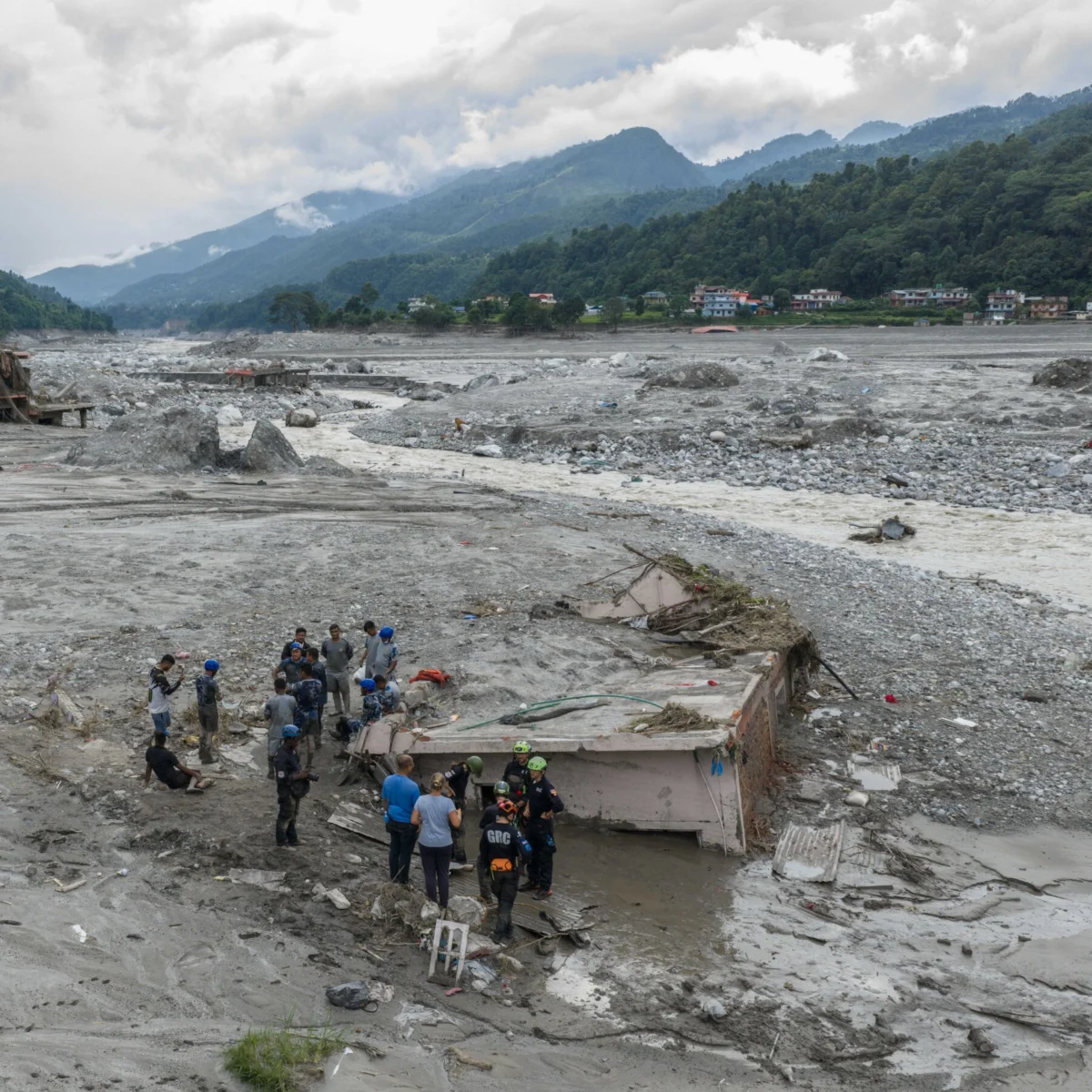 Nepal Floods Bury House as Woman Survives Inside