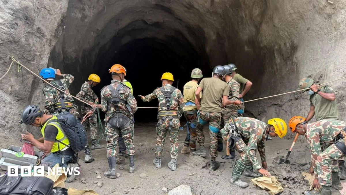 Nepal rescuers use explosives to reach trapped hydropower workers