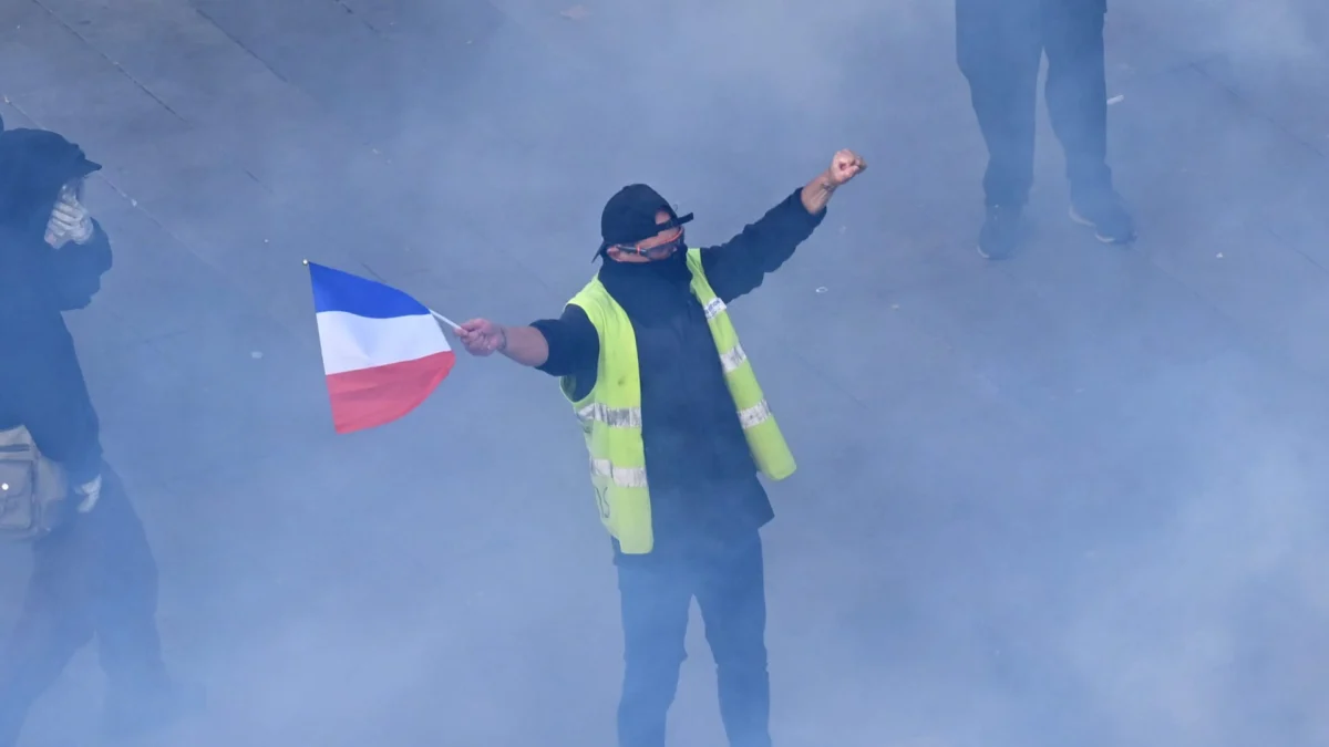 French police clash with protesters over cost of living