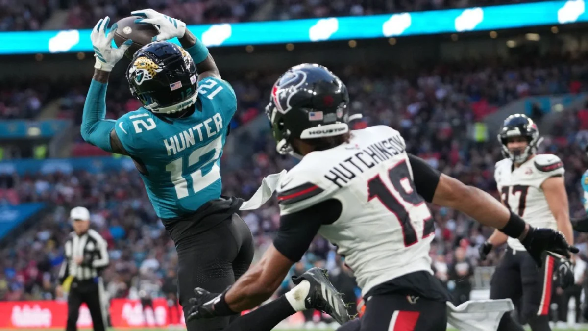 Hunter stars in Jags’ loss, is 1st with INT and TD catch in game since ’02