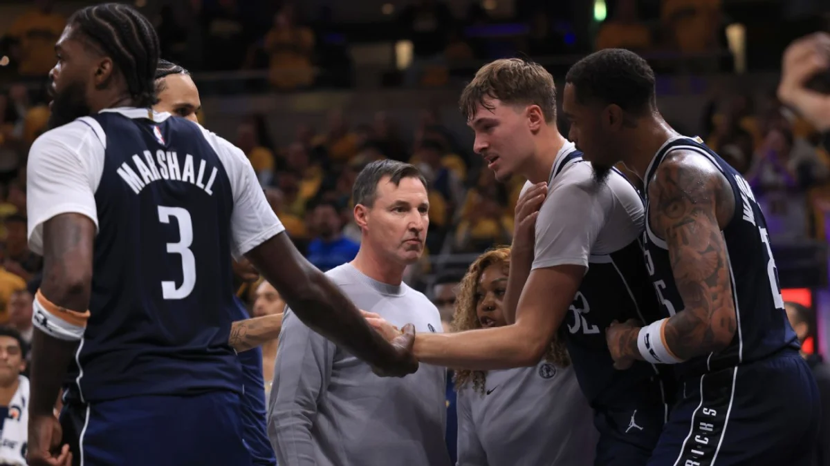 Mavericks’ Cooper Flagg exits game after shoulder injury from Aaron Nesmith foul