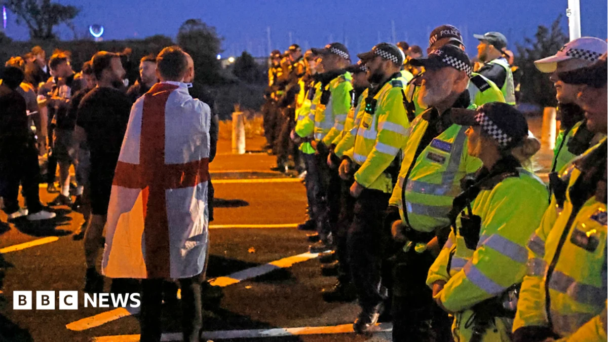 Police Scuffle With Migrants Ashore on South Coast